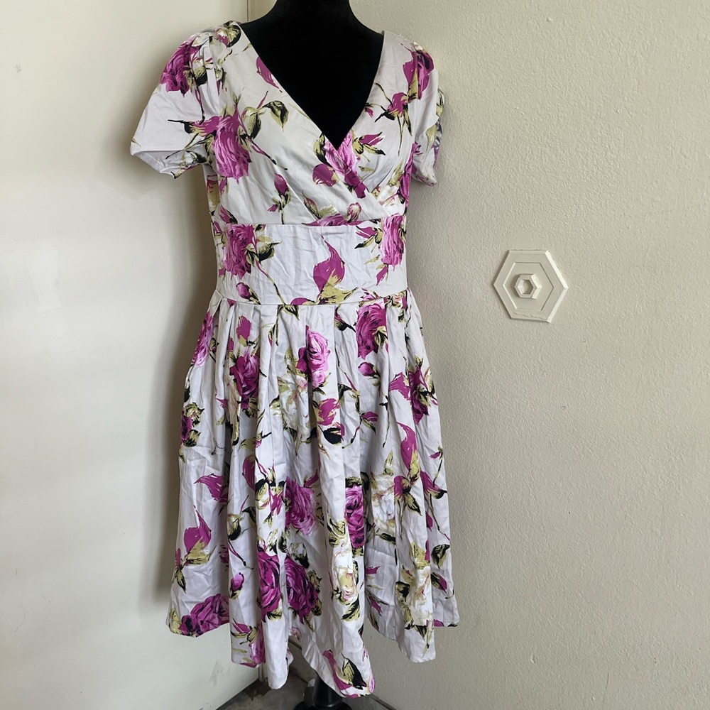 The perfect  dress for prom, a wedding, church event, etc.